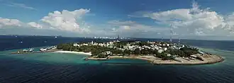 Aerial view of the whole of Villingili with ماله (مالدیو) in the background,