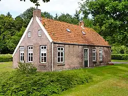 Red brick house with two chimneys