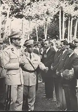 دیدار بزرگان ایل بالاوند با محمد رضا پهلوی از سمت راست ایستاده نفر دوم عباس خان اسفندیاری نفر سوم خان احمد خان اسفندیاری