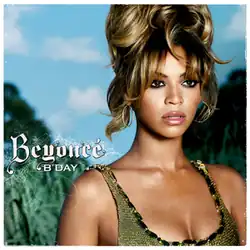 Album cover which shows a young woman in a low-cut dress, with dark eyeliner and hair pinned high on her head.