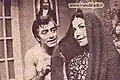 پوری بنایی و محمدعلی فردین در نمایی از فیلم کوچه مردها (۱۳۴۹)