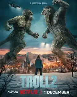 A woman watching two giant-size trolls about to fight each other.