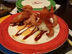 two hot dogs cut to look like octopuses