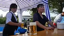 Street food vendors selling draft beer at the 10th Pyongyang Autumn International Trade Fair