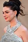 Picture of actress Anne Hathaway smiling at the premiere of The Odyssey in New York