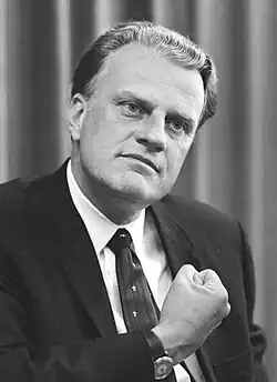 A black-and-white image of Billy Graham