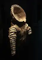 Model of a Saka cataphract armour with neck-guard, from Khalchayan. 1st century BCE. Museum of Arts of Uzbekistan, nb 40.