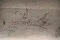 Drawings of a reclining woman and a flying man/angel on the south wall