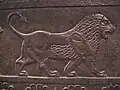 نقش شیر بر روی یک دیوار تخت جمشید