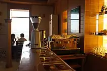 Coffee beans and an espresso machine at a coffee shop located next to the Pyongyang Hotel in Pyongyang, North Korea