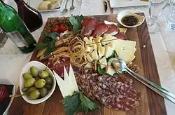 A platter of lunch meat and cheeses in Slovenia