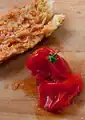 پا آمب توماکت با گوجه‌فرنگی فشرده‌شده پس از بهره‌گیری از آن